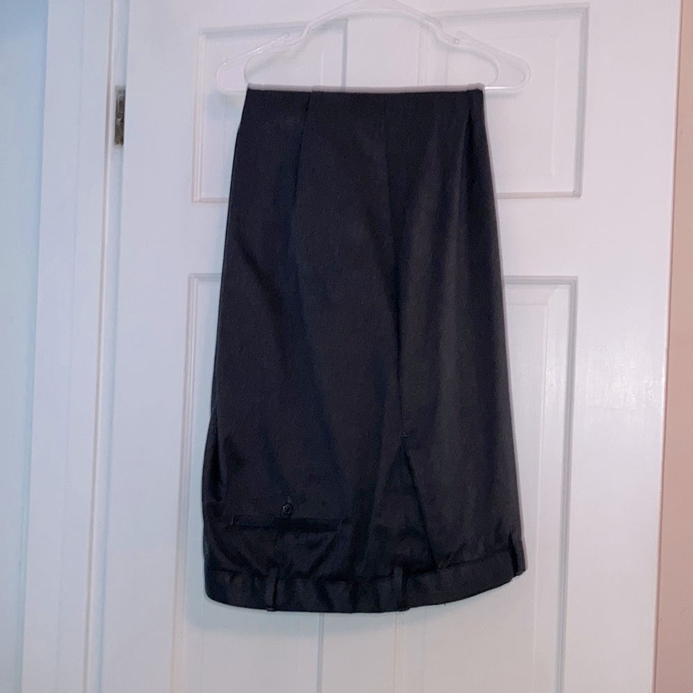 Worn just once and freshly washed, men’s big and tall charcoal grey slacks 52T